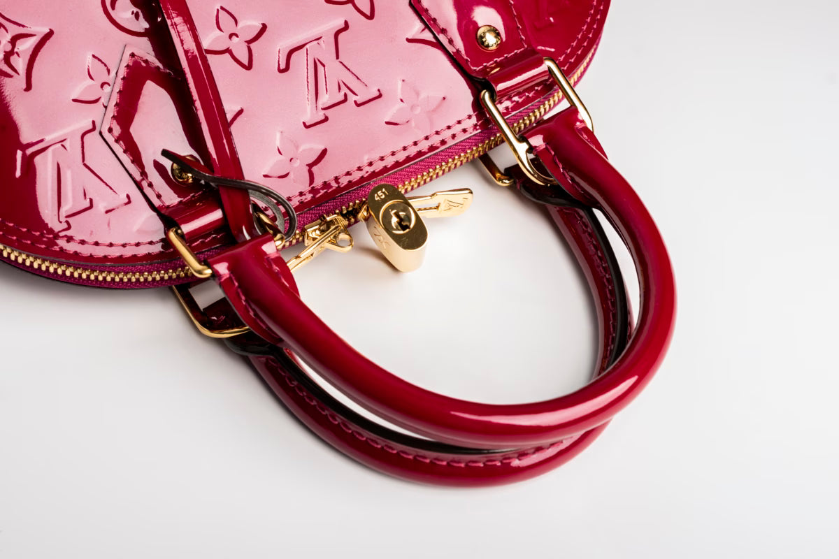 Çantë dore Louis Vuitton Alma Monogram Canva