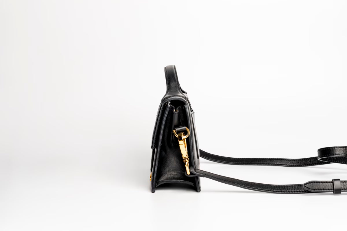 The large Bambino Handbag with adjustable crossbody strap