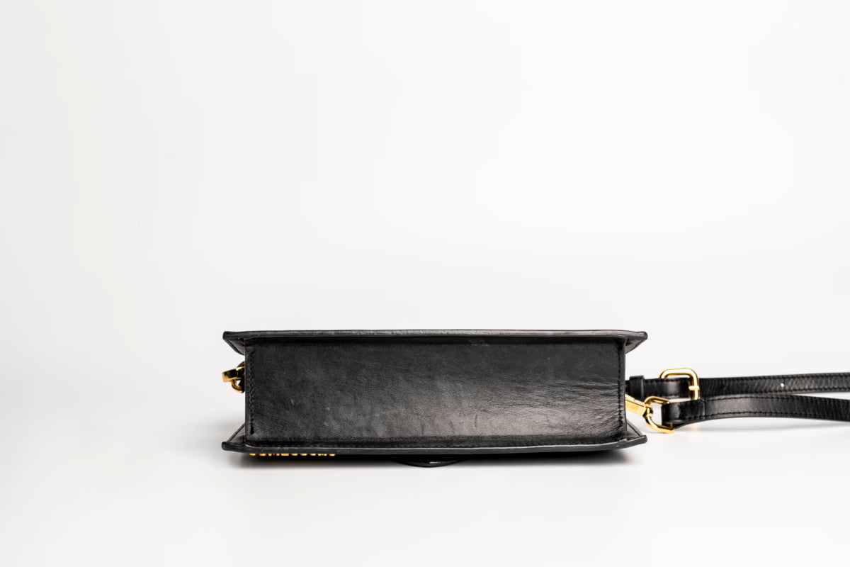 The large Bambino Handbag with adjustable crossbody strap
