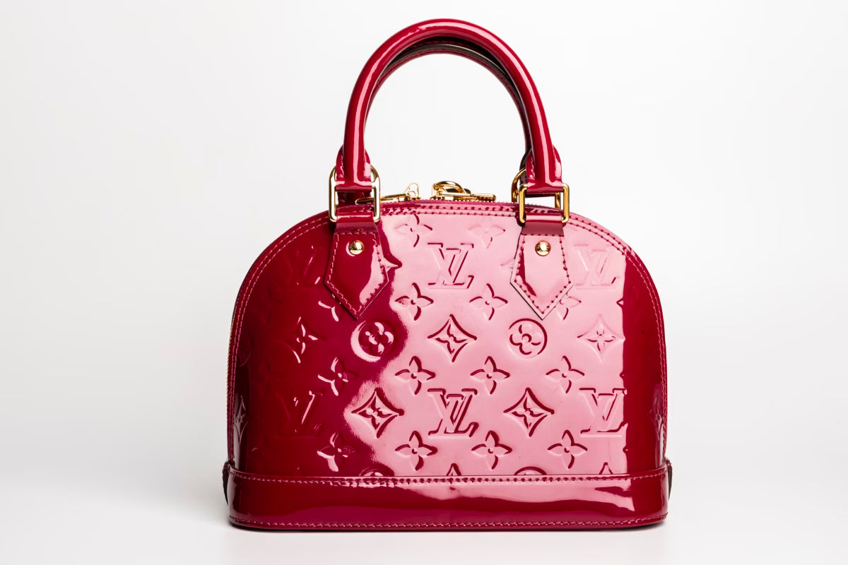 Çantë dore Louis Vuitton Alma Monogram Canva