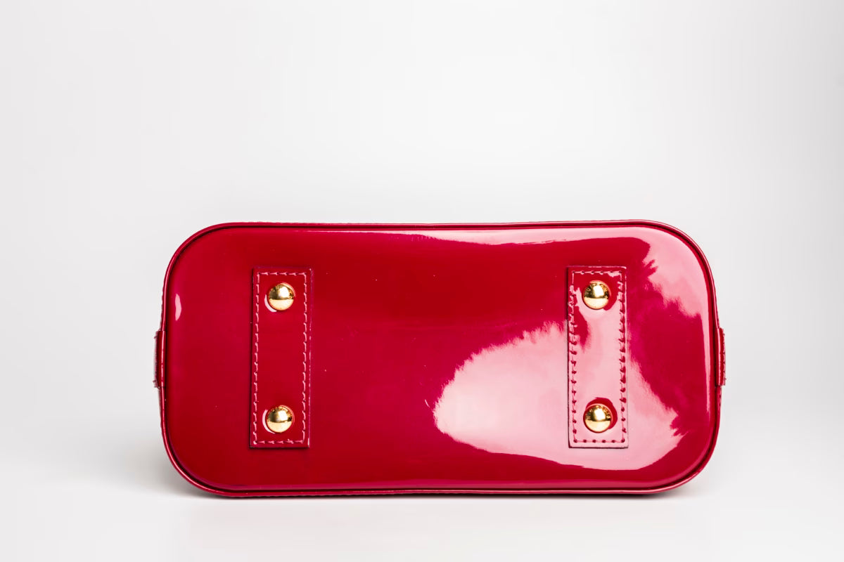 Çantë dore Louis Vuitton Alma Monogram Canva