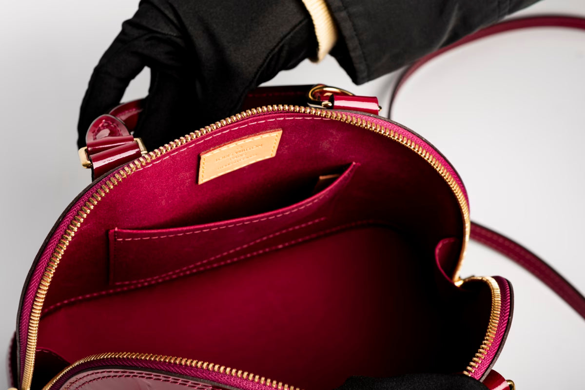 Çantë dore Louis Vuitton Alma Monogram Canva