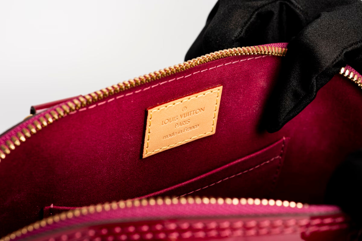 Çantë dore Louis Vuitton Alma Monogram Canva