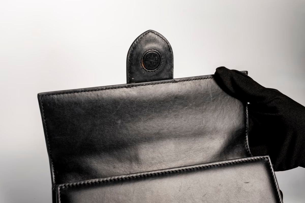 The large Bambino Handbag with adjustable crossbody strap