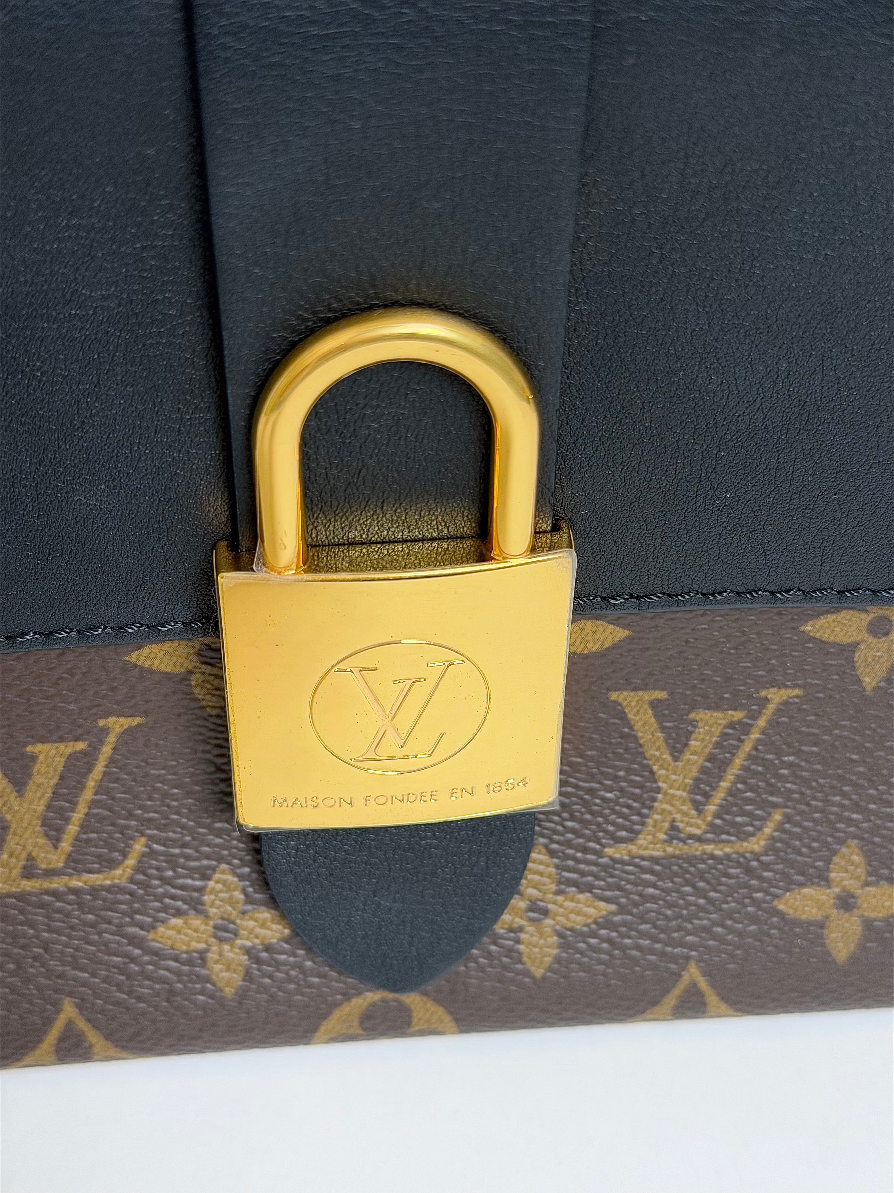 Louis Vuitton Locky Handbag Monogram Canva